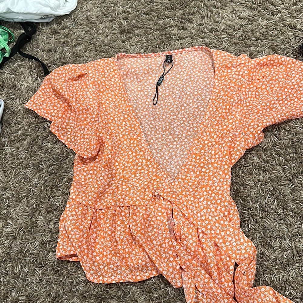 Floral cross over top
